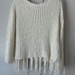 Altar’d State S cream sweater with fringe bottom hem.